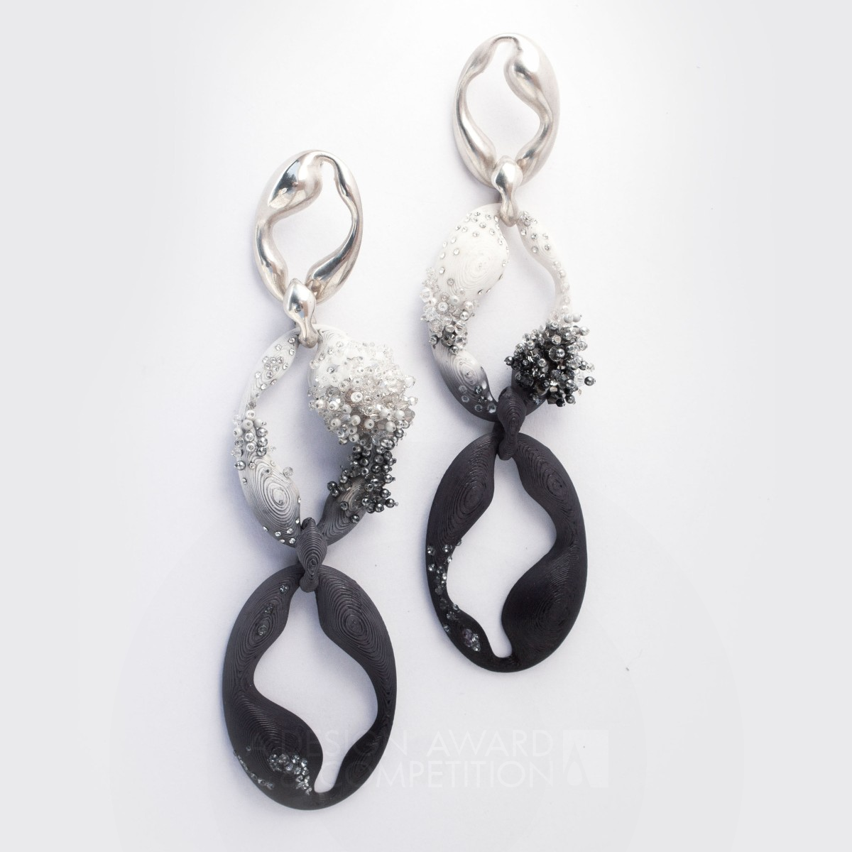 Chiaroscuro Jewelry Collection  by Maya McCormack Bronze Jewelry Design Award Winner 2021 