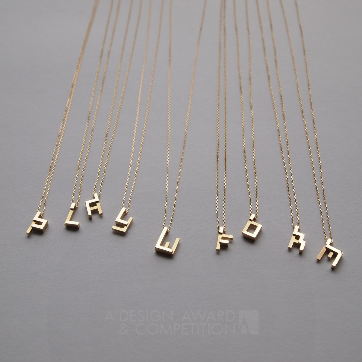 Alphabet Block Chatter Pendant by Yoko Kakuchi Golden Jewelry Design Award Winner 2017 