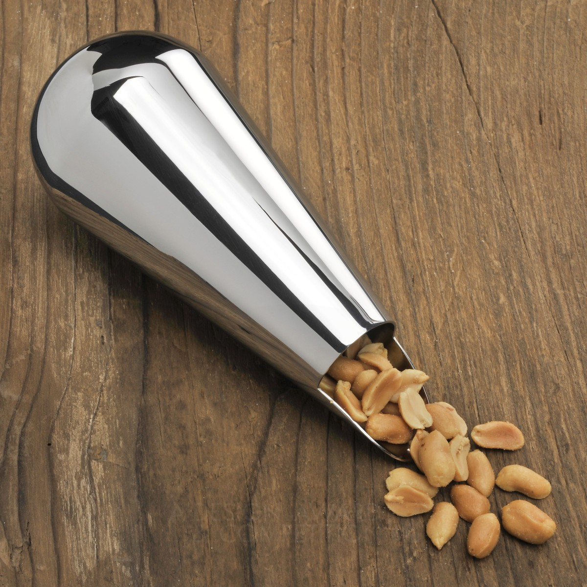 Erdnussschütte To get peanuts without touching themUniq by Mario Taepper Golden Bakeware, Tableware, Drinkware and Cookware Design Award Winner 2017 