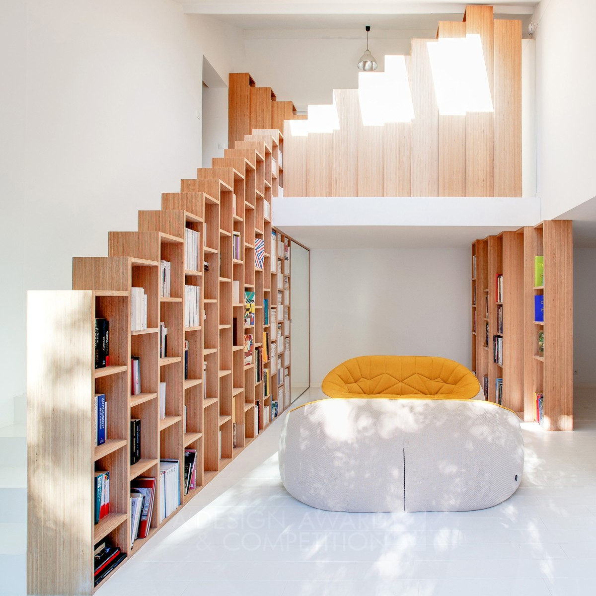 The Bookshelf House Interior renovation of a Private House by Andrea Mosca Creative Studio Bronze Interior Space and Exhibition Design Award Winner 2017 