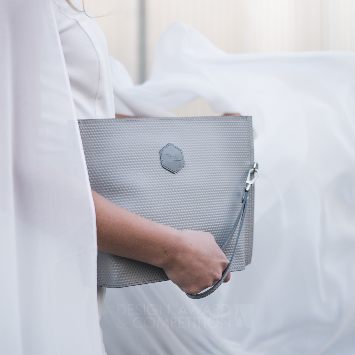 Mina Clutch Bag by Koralia Giori Silver Fashion and Travel Accessories Design Award Winner 2019 