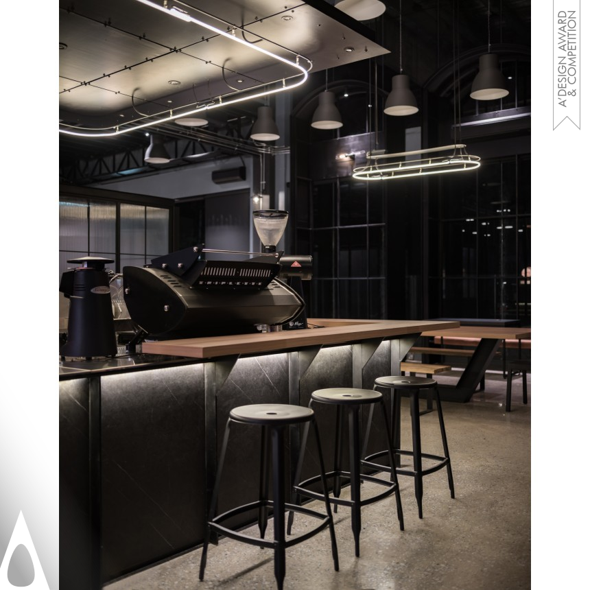 Chaos Design Studio's Industrial Dynamic Autocare Cafe