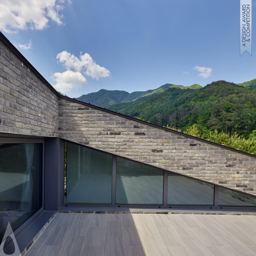 Slope House - Silver Architecture, Building and Structure Design Award Winner