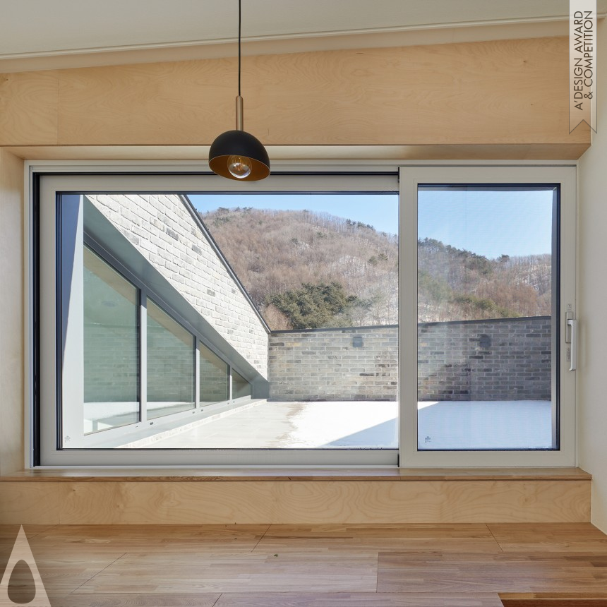 Kyungsik Kim's Slope House Residence