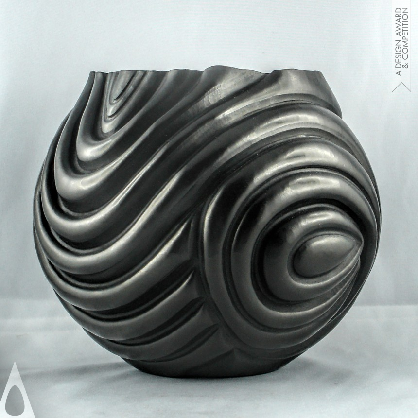 VORTEX METALLIC VASES designed by Gilles Laot