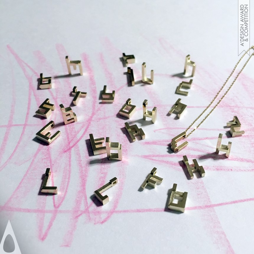 Golden Jewelry Design Award Winner 2017 Alphabet Block Chatter Pendant 