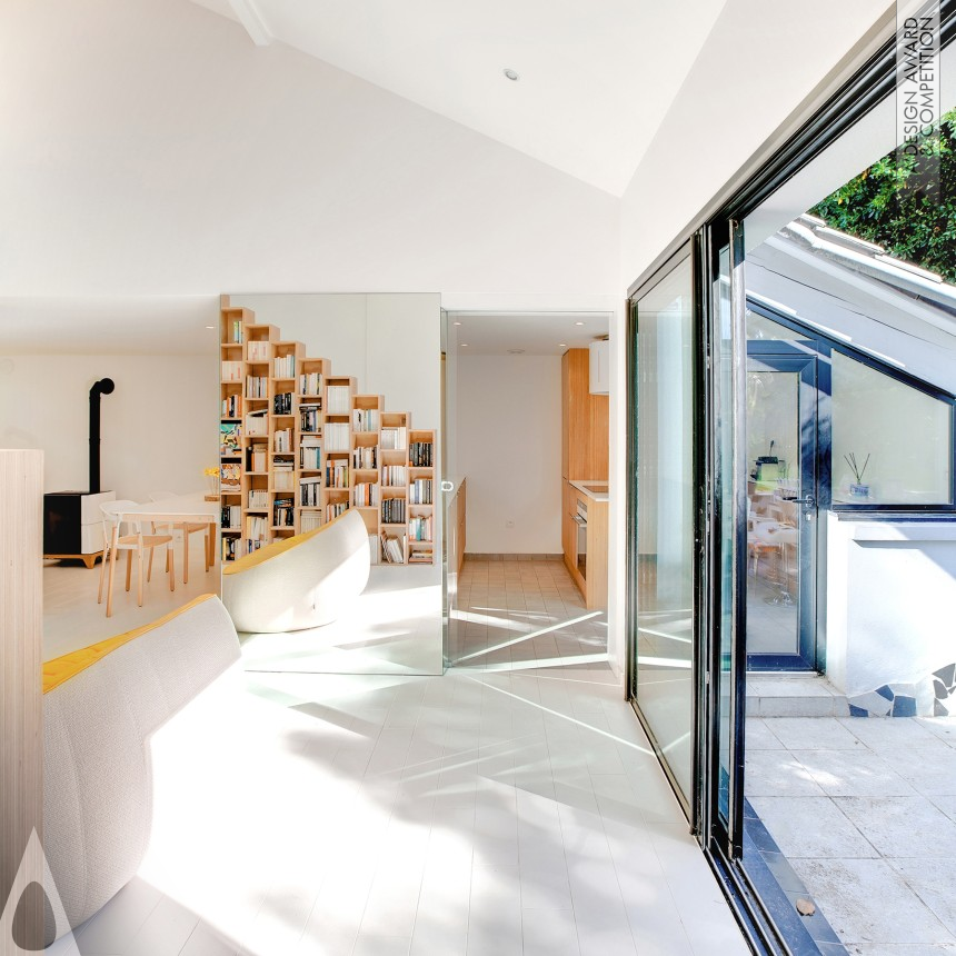 Andrea Mosca Creative Studio's The Bookshelf House Interior renovation of a Private House