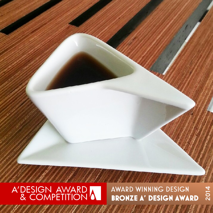 LOA Coffe Cup Drink coffee and saucer by Josué Rivera Gandîa Bronze Bakeware, Tableware, Drinkware and Cookware Design Award Winner 2014 