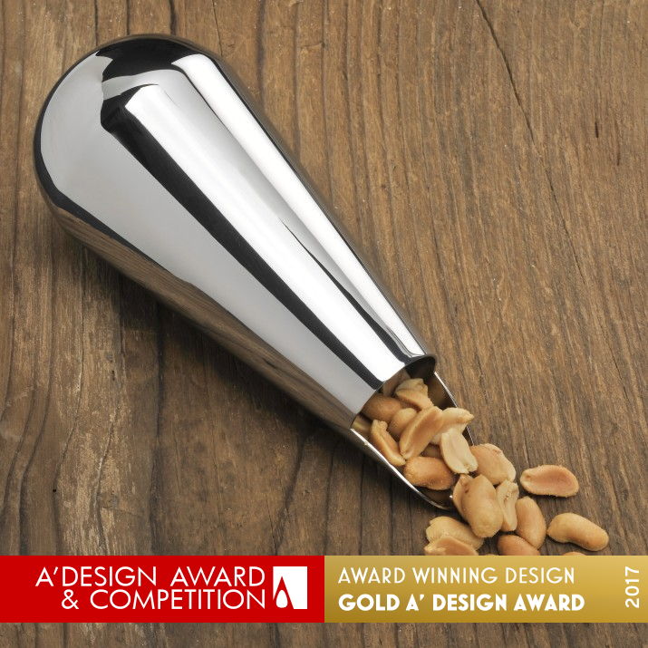 Erdnussschütte To get peanuts without touching themUniq by Mario Taepper Golden Bakeware, Tableware, Drinkware and Cookware Design Award Winner 2017 